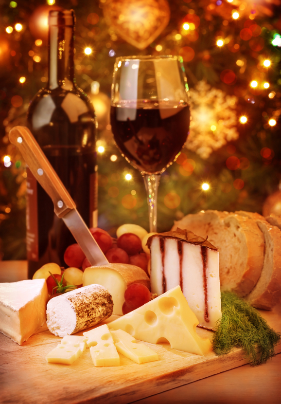 Christmas dinner at home, cheese and wine table setting, cozy atmosphere on Christmas eve