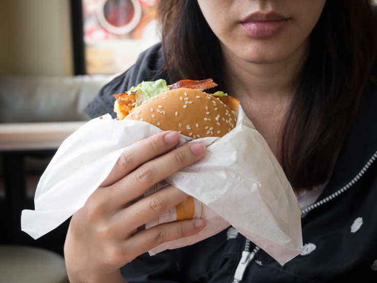 riot-eating-unhealthy-burger
